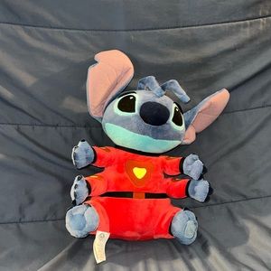 4 armed stitch plush in orange jumpsuit